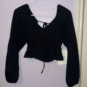 Cropped long sleeve ties in the back